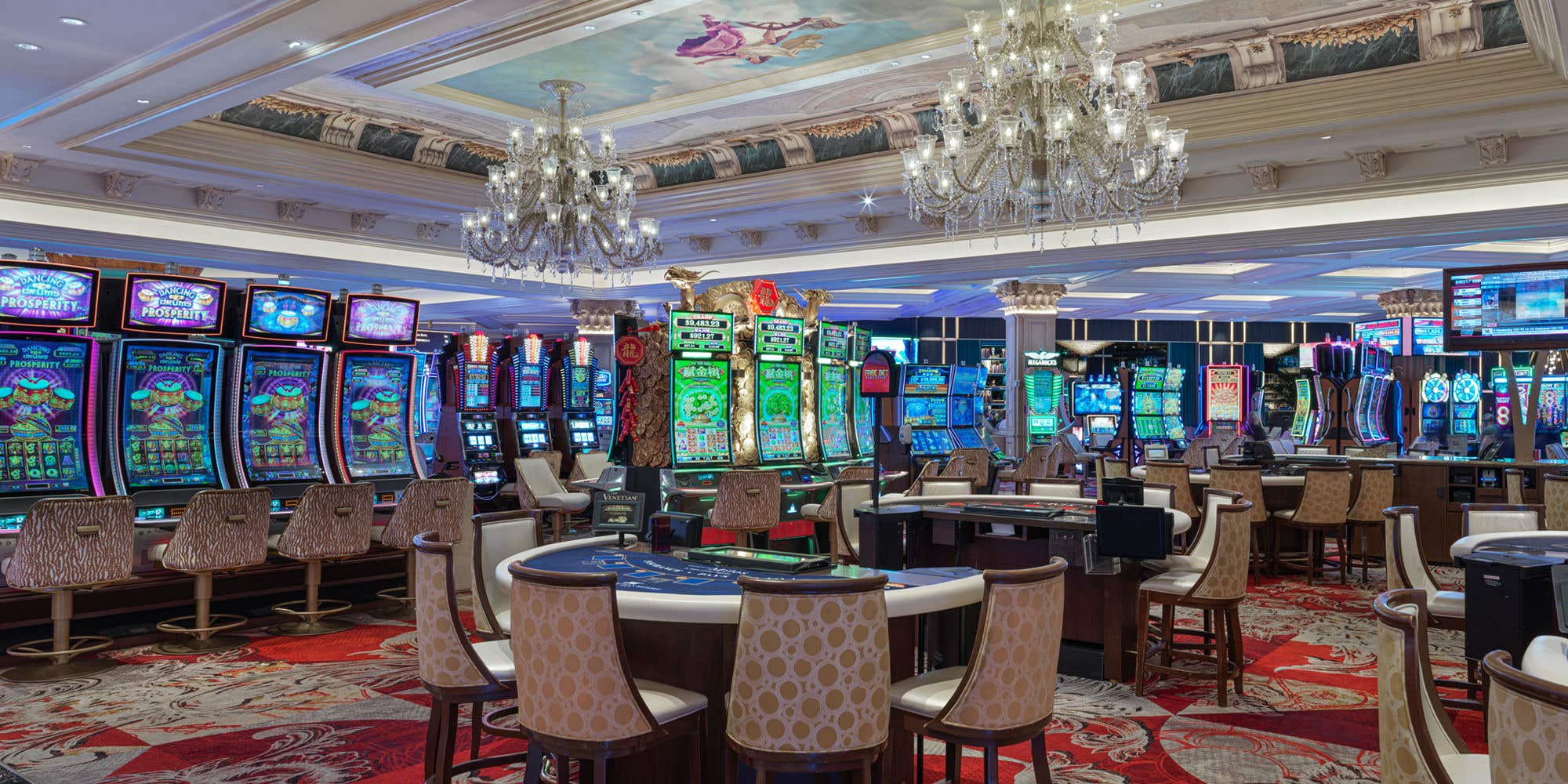 Casino floor of The Venetian Resort with table games and slot machines