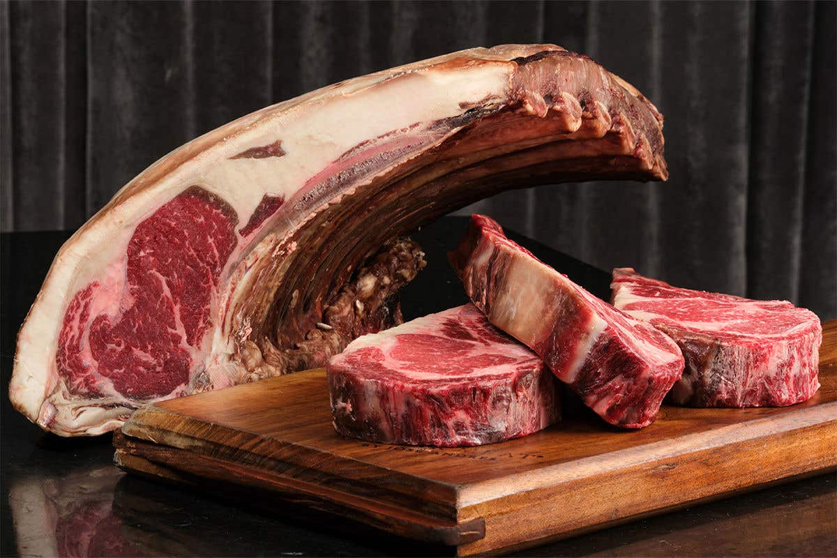 Cuts of raw meat on a chopping board